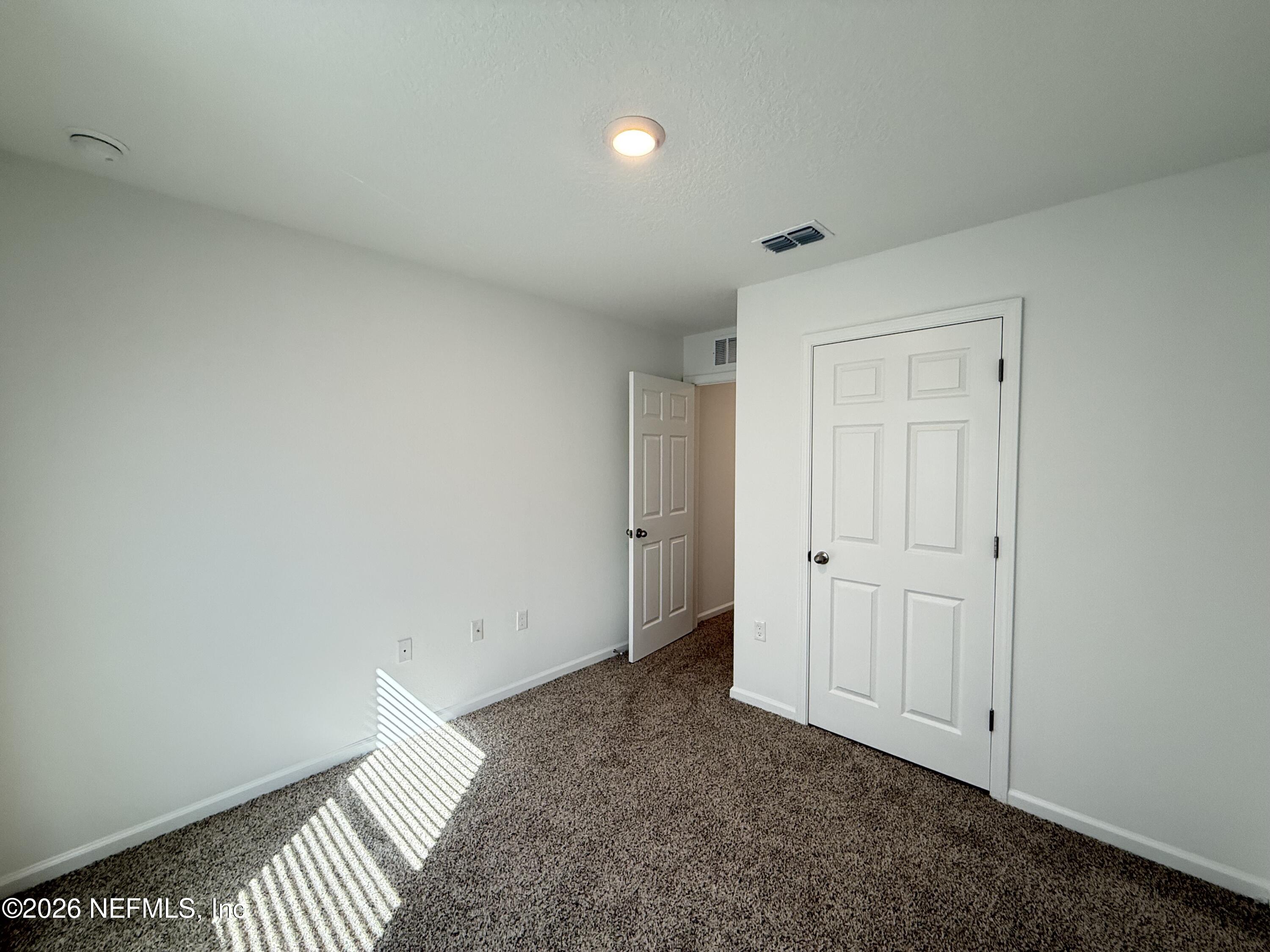 88 Crisanto Road St. Augustine, FL 32084 - Photo 13 of 21 wooden floor in an empty room