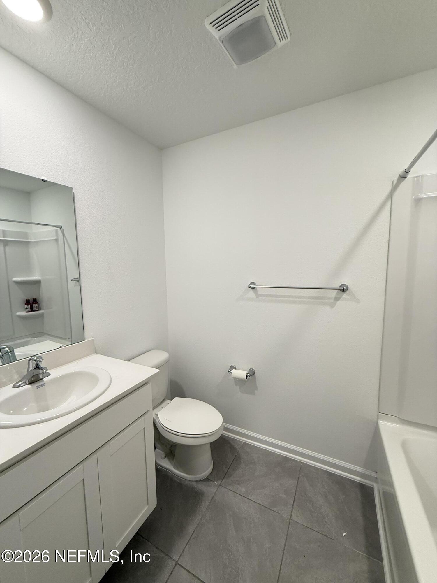 88 Crisanto Road St. Augustine, FL 32084 - Photo 19 of 21 a bathroom with a sink a toilet and shower