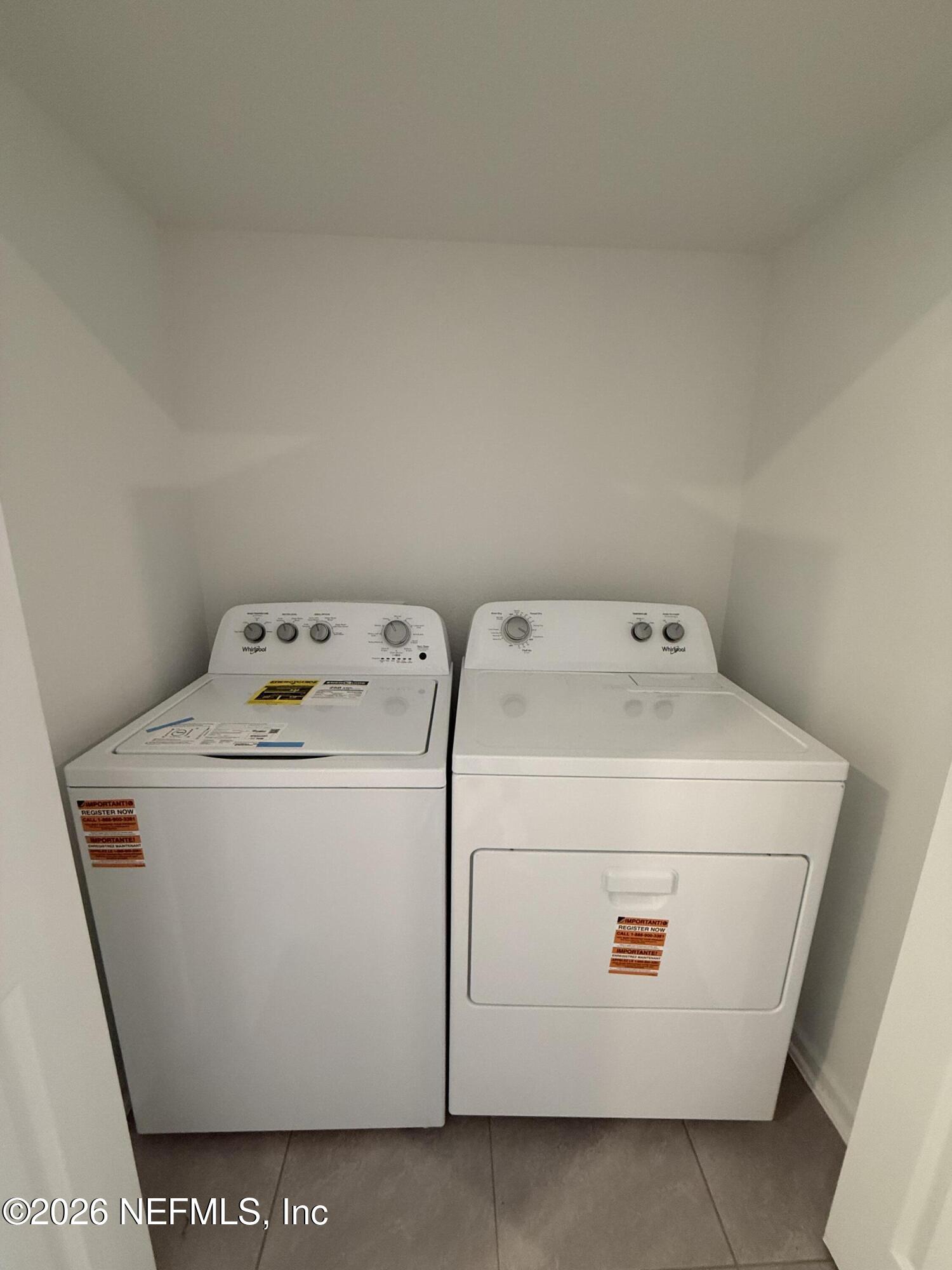 88 Crisanto Road St. Augustine, FL 32084 - Photo 8 of 21 a utility room with dryer and washer