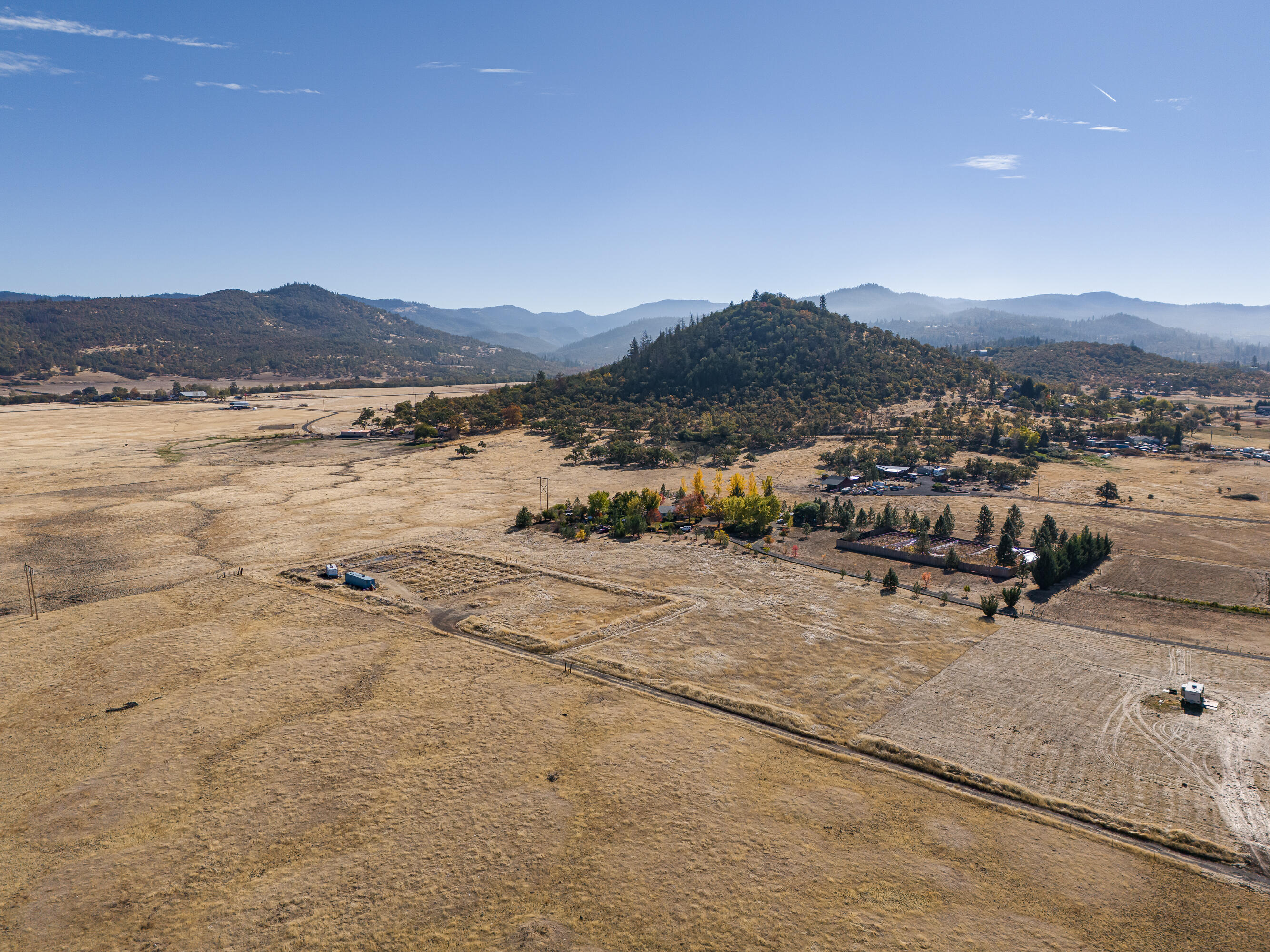 873 Dry Creek Road Eagle Point, OR 97524 - Photo 3 of 13 a view of a lake with mountain view