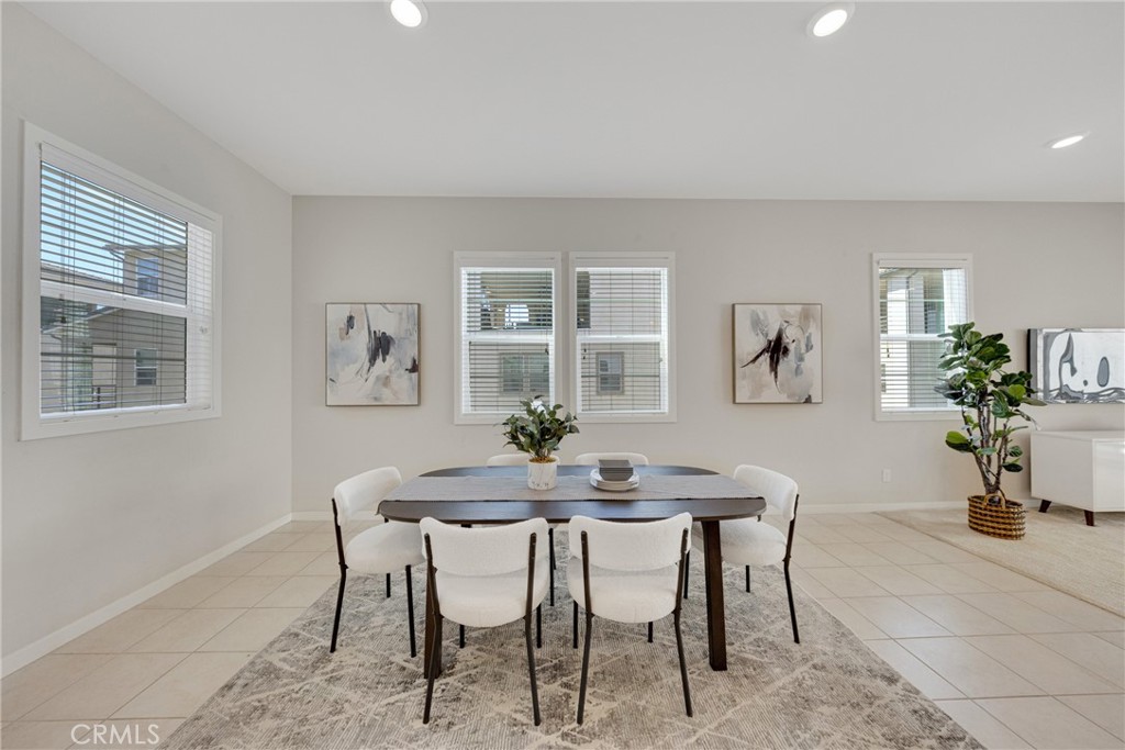 104 Sculpture Irvine, CA 92618 - Photo 13 of 36 a dining room with furniture and window