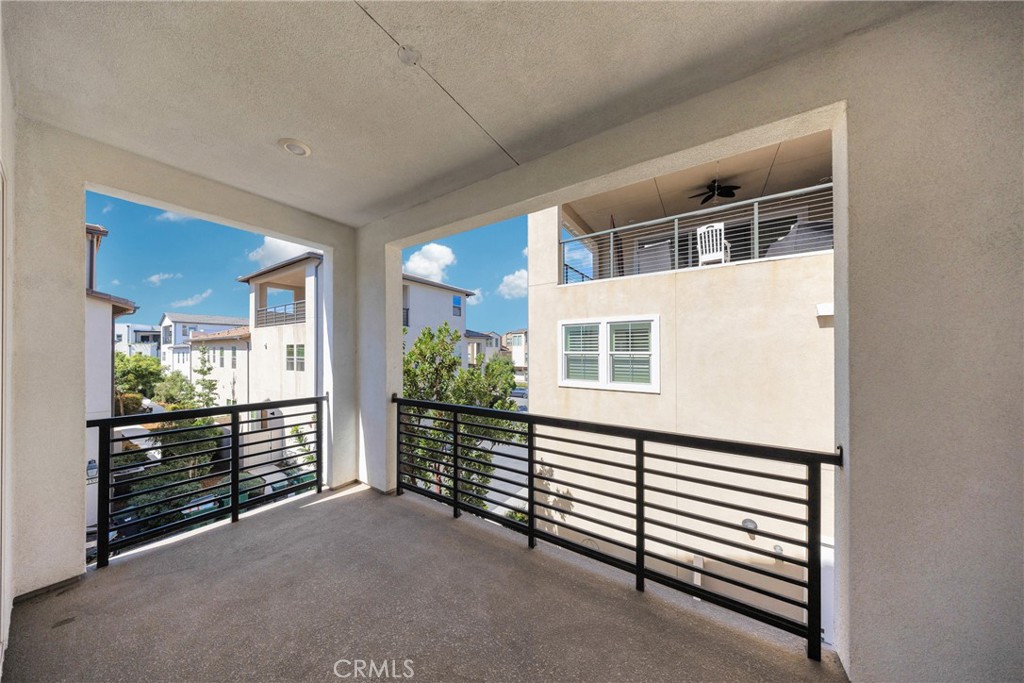 104 Sculpture Irvine, CA 92618 - Photo 14 of 36 a view of a hallway with entryway and stairs