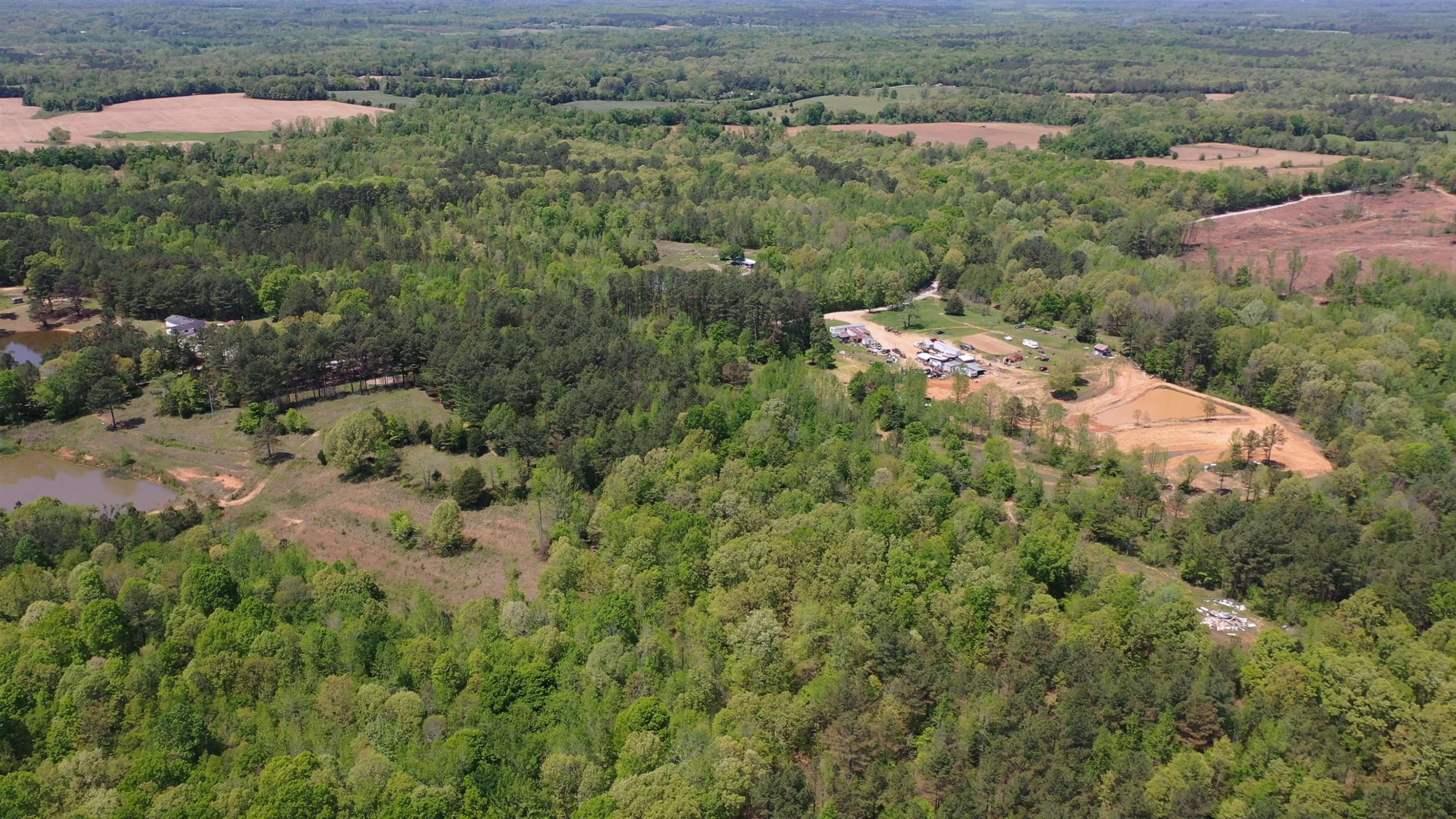 0 Malone Cemetery Road Finger, TN 38334 - Photo 4 of 13 an aerial view of a house with a yard