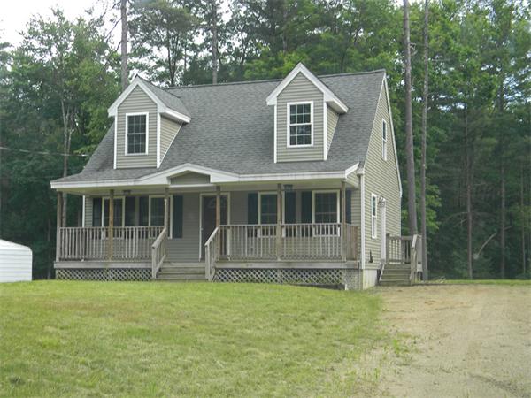 88 Eagleville Road Orange, MA 01364 - Photo 1 of 14 a front view of a house with garden