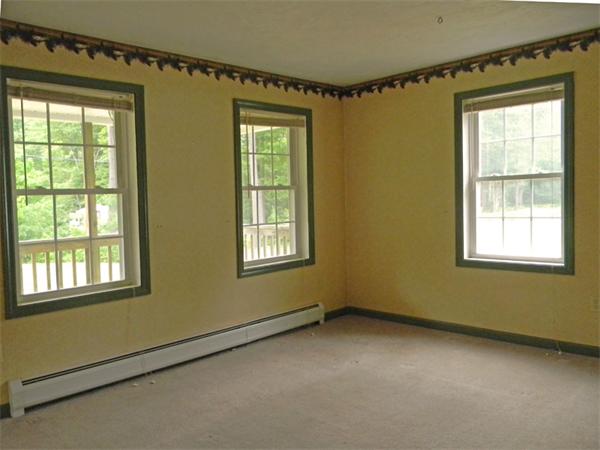 88 Eagleville Road Orange, MA 01364 - Photo 8 of 14 a view of an empty room with a window