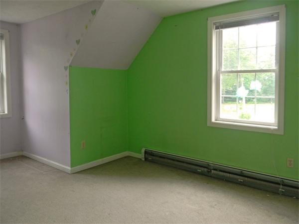88 Eagleville Road Orange, MA 01364 - Photo 10 of 14 a room with a window and a fan