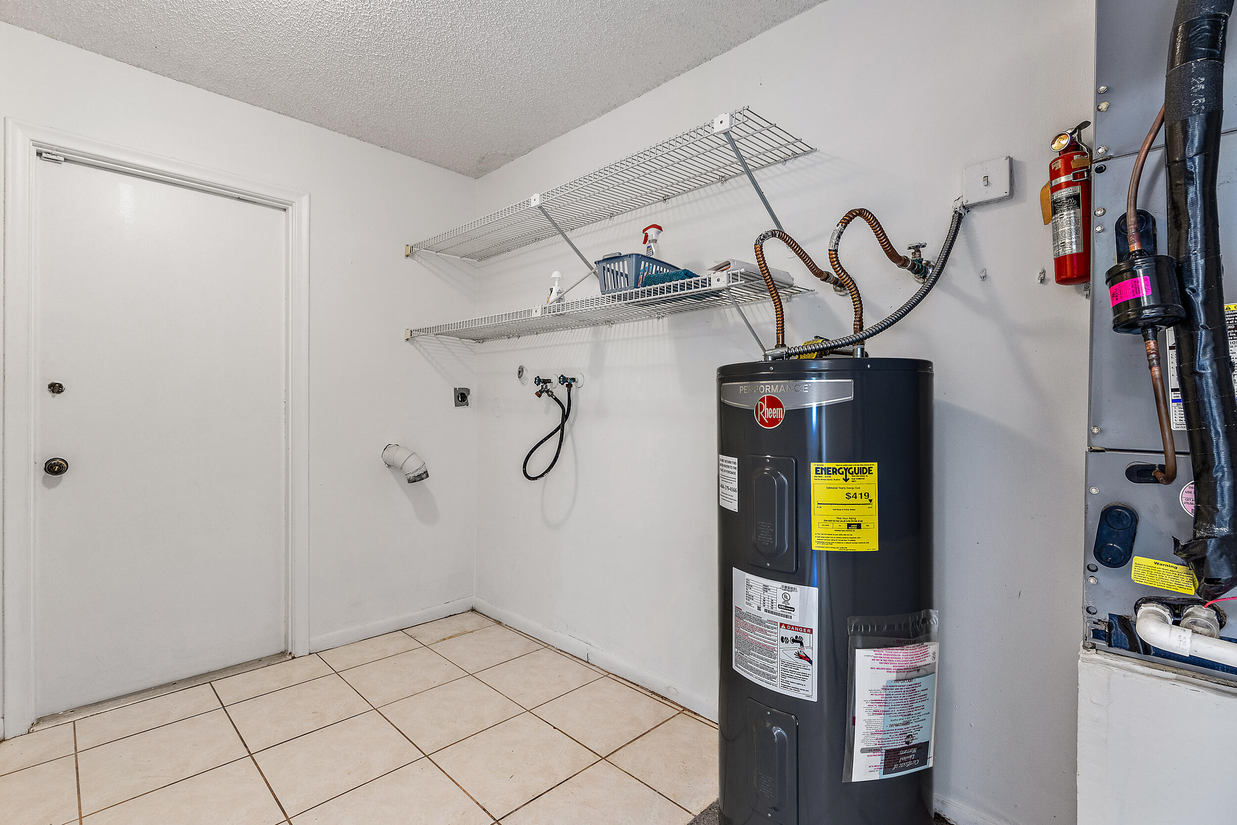 7938 Cloverfield Circle Boca Raton, FL 33433 - Photo 19 of 27 a view of storage and utility room