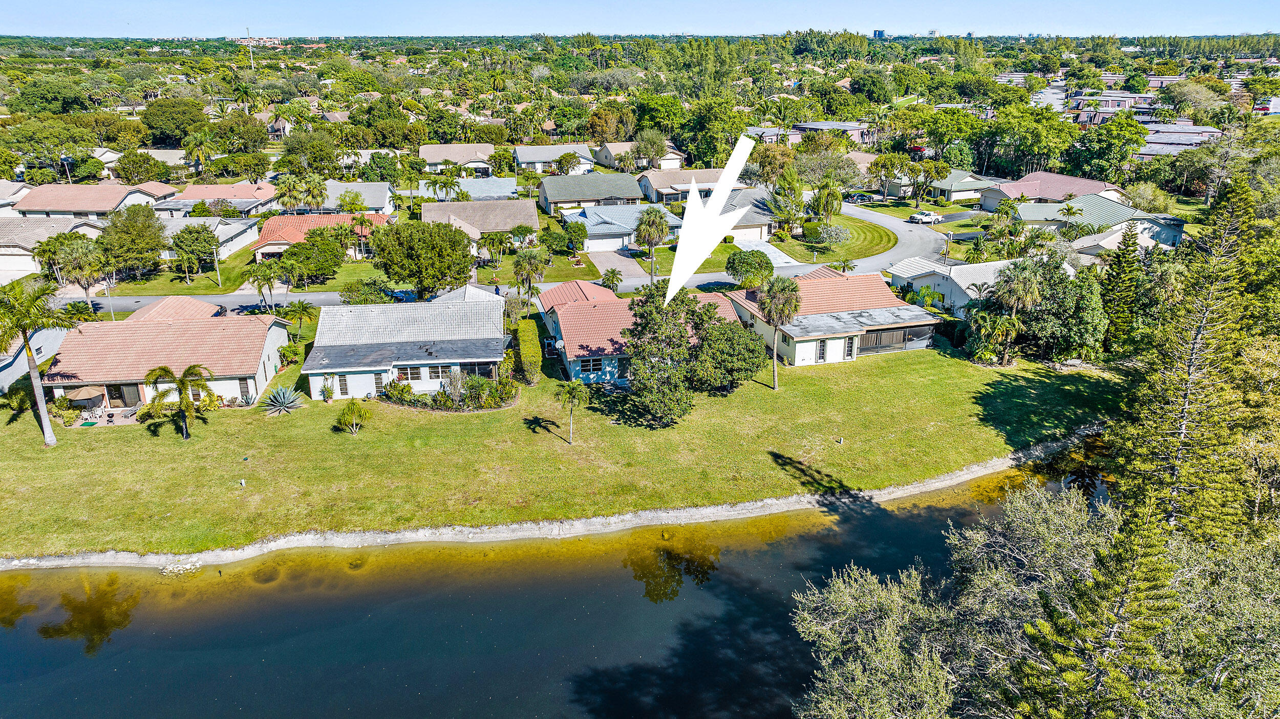 7938 Cloverfield Circle Boca Raton, FL 33433 - Photo 23 of 27 an aerial view of residential houses with outdoor space
