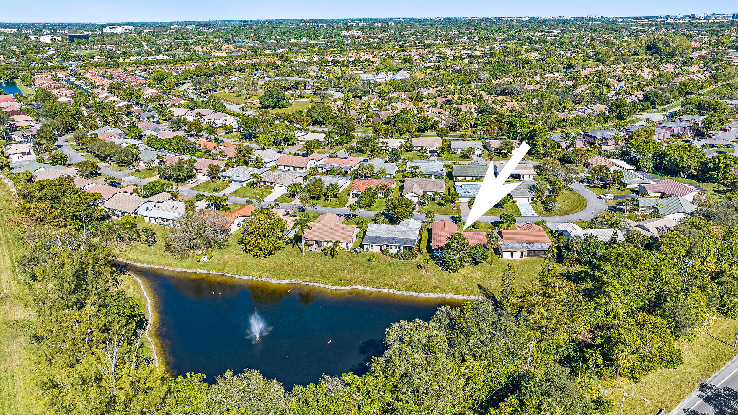 7938 Cloverfield Circle Boca Raton, FL 33433 - Photo 24 of 27 an aerial view of a house with a garden