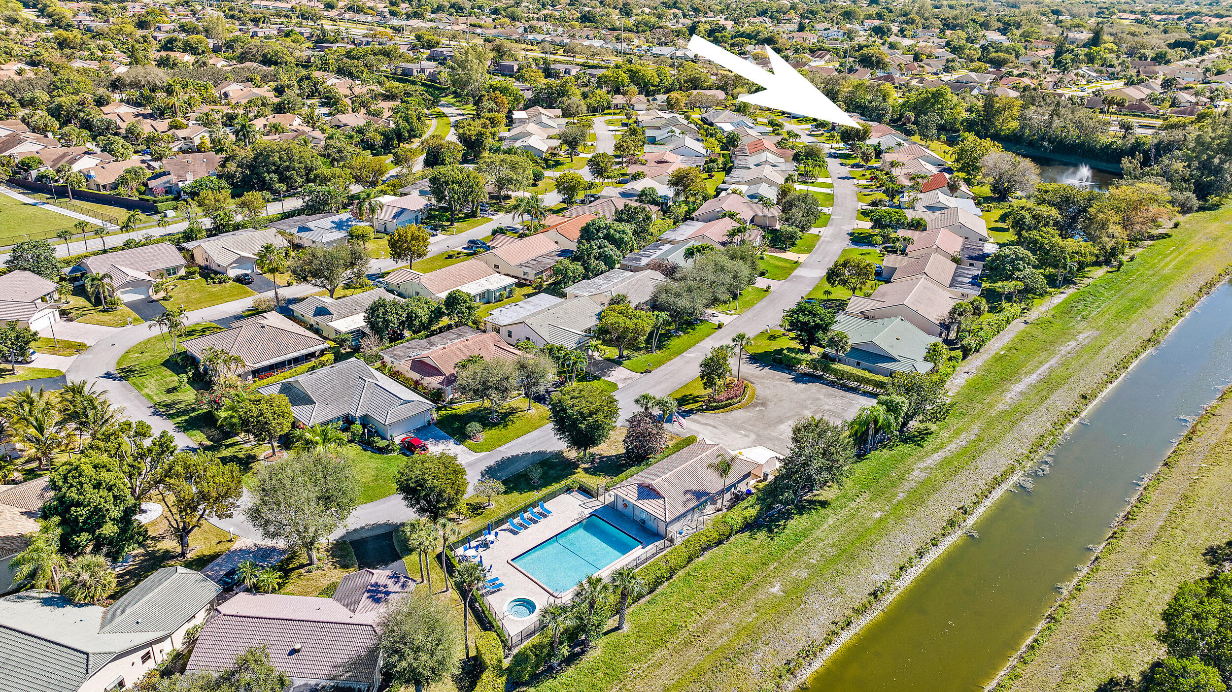 7938 Cloverfield Circle Boca Raton, FL 33433 - Photo 25 of 27 an aerial view of residential houses with outdoor space