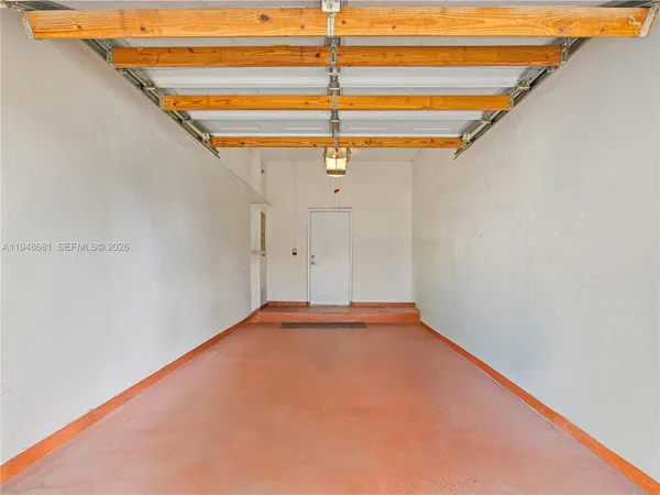 an aerial view of residential building with green space