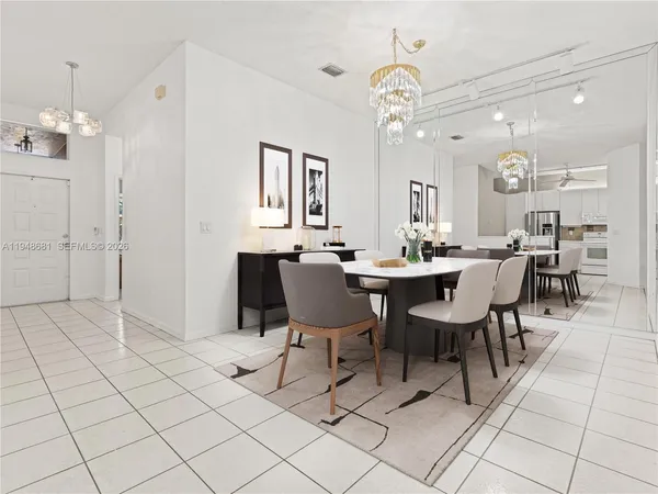 a view of a dining room with furniture