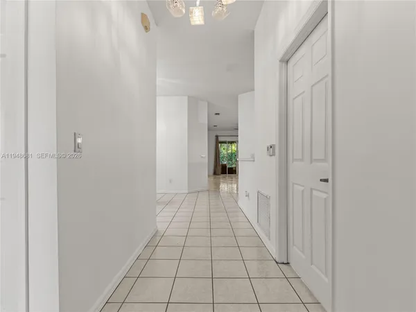 a bathroom with a shower sink vanity mirror and toilet