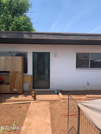 a black white building with a outdoor space