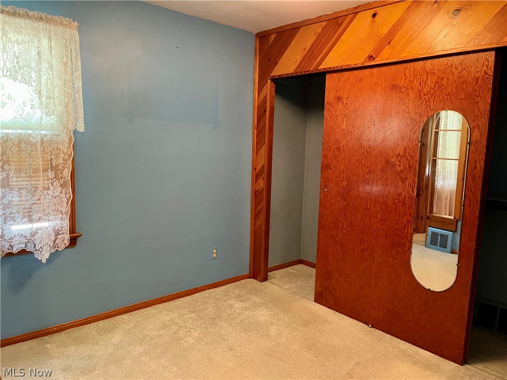 6807 Biddulph Road Brooklyn, OH 44144 - Photo 16 of 35 1st floor bedroom w/ large closet