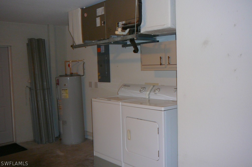 8221 Matanzas Road Fort Myers, FL 33967 - Photo 16 of 24 a utility room with dryer and washer