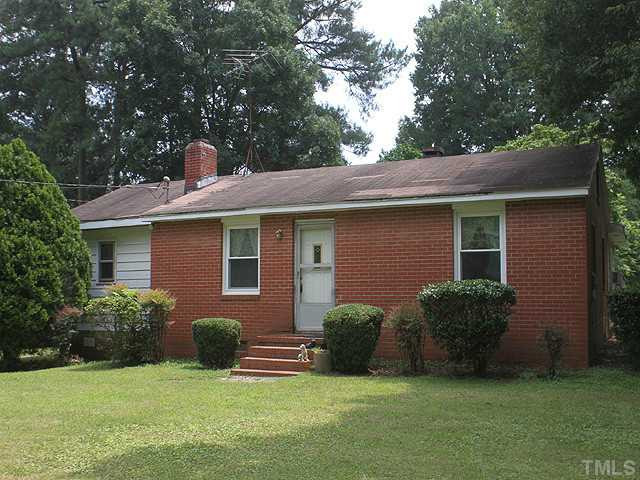 2135 Winkler Road Durham, NC 27712 - Photo 1 of 13 a view of a house with a yard and sitting area