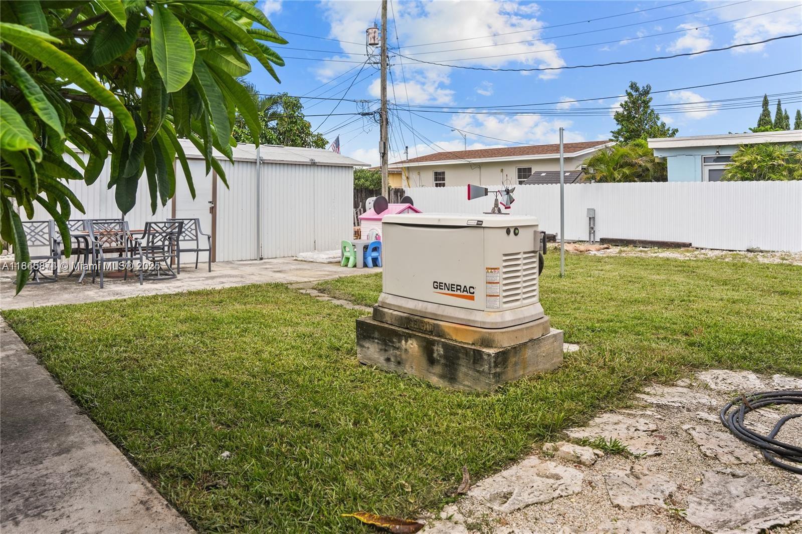 117 West 34th Street Hialeah, FL 33012 - Photo 20 of 27 a view of a backyard with a garden and plants