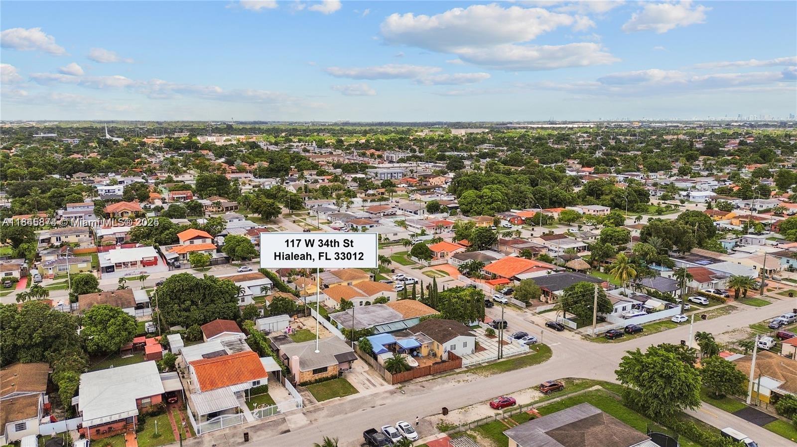 117 West 34th Street Hialeah, FL 33012 - Photo 26 of 27 an aerial view of a city