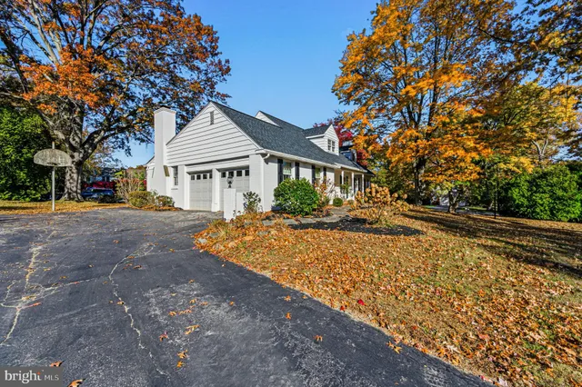 a house with trees in the background