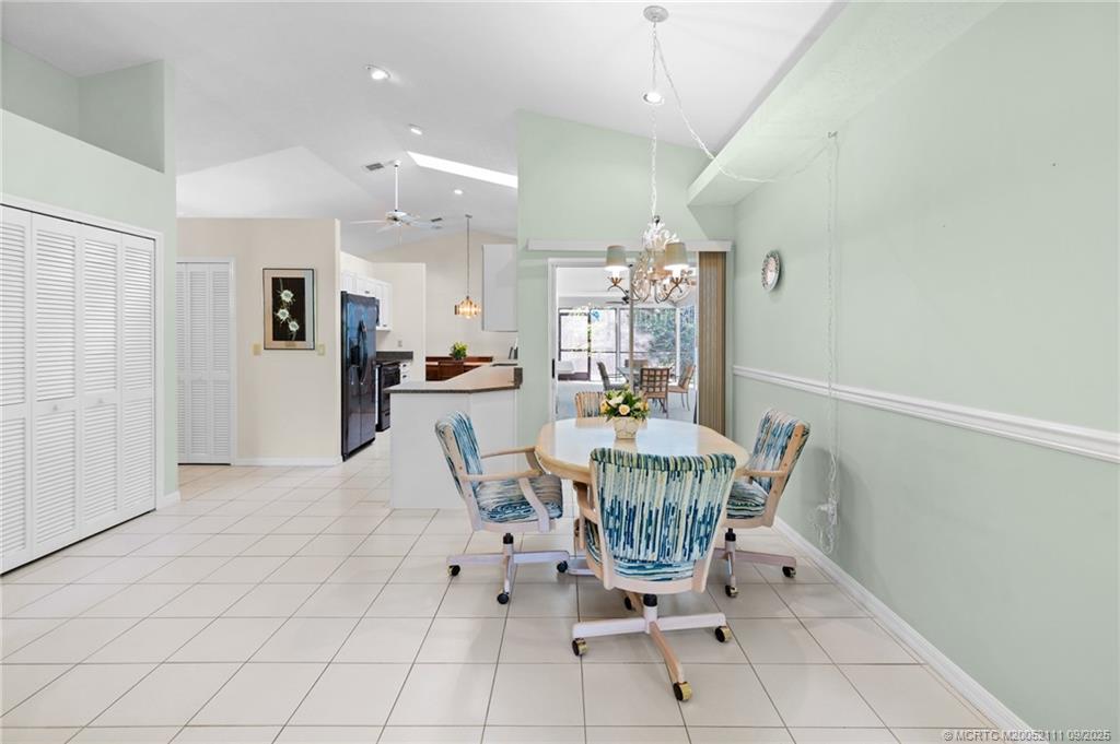 3418 Southeast Jamaica Way Stuart, FL 34997 - Photo 18 of 35 a view of a dining room with furniture