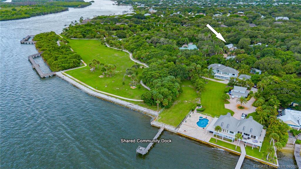 3418 Southeast Jamaica Way Stuart, FL 34997 - Photo 2 of 35 a bird view of a garden with chairs