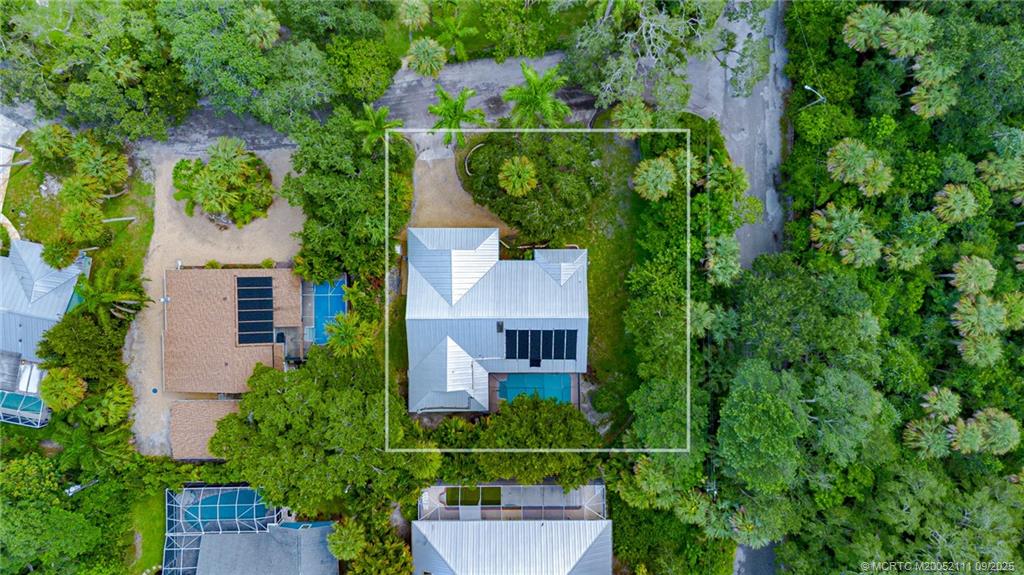 3418 Southeast Jamaica Way Stuart, FL 34997 - Photo 7 of 35 an aerial view of a house with outdoor space and street view