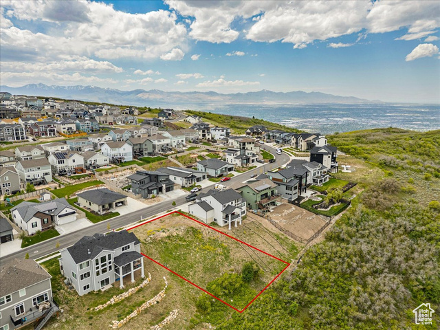14673 South Ravine Rock Way East, Unit 720 Draper, UT 84020 - Photo 7 of 15 Aerial view of residential area featuring property parcel outlined and a water and mountain view