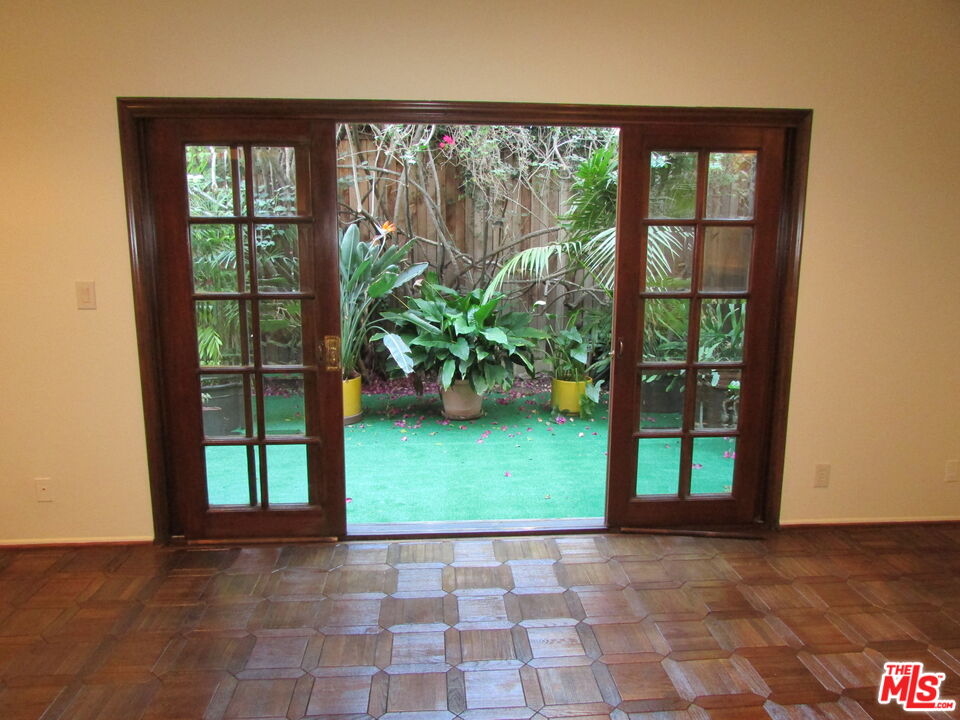 1850 Midvale Avenue, Unit 7 Los Angeles, CA 90025 - Photo 4 of 13 a view of entryway with garden