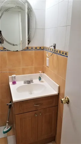 a bathroom with a toilet and shower