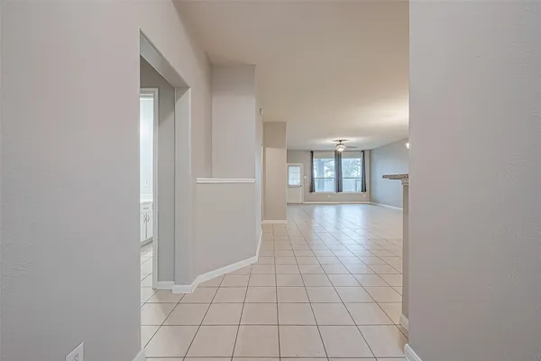 a view of an empty room and window