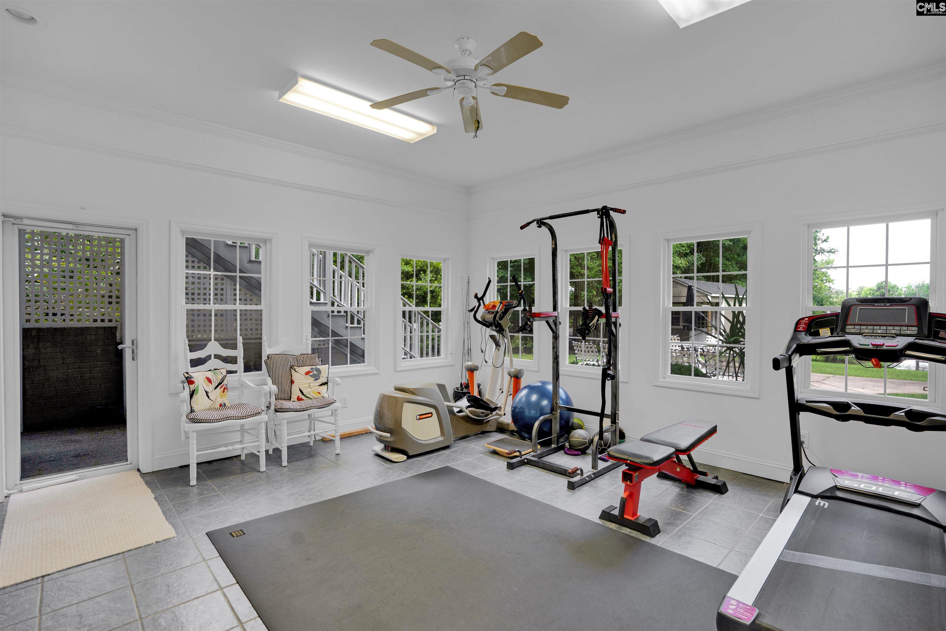 1101 Ellett Road Chapin, SC 29036 - Photo 15 of 24 a view of a room with gym equipment