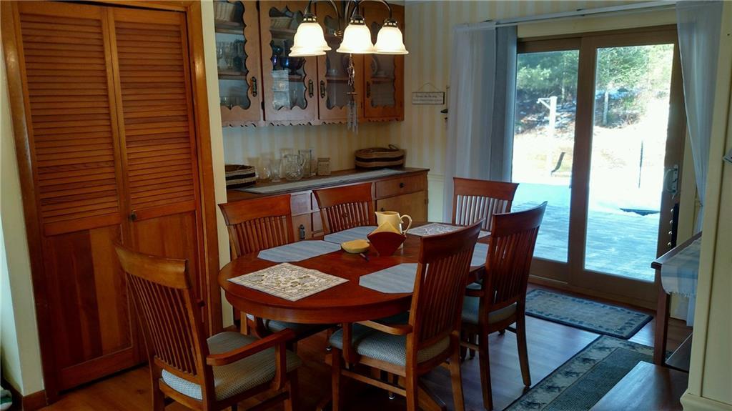 441 Augusta Road Washington, ME 04574 - Photo 6 of 28 dining room with view to deck &...