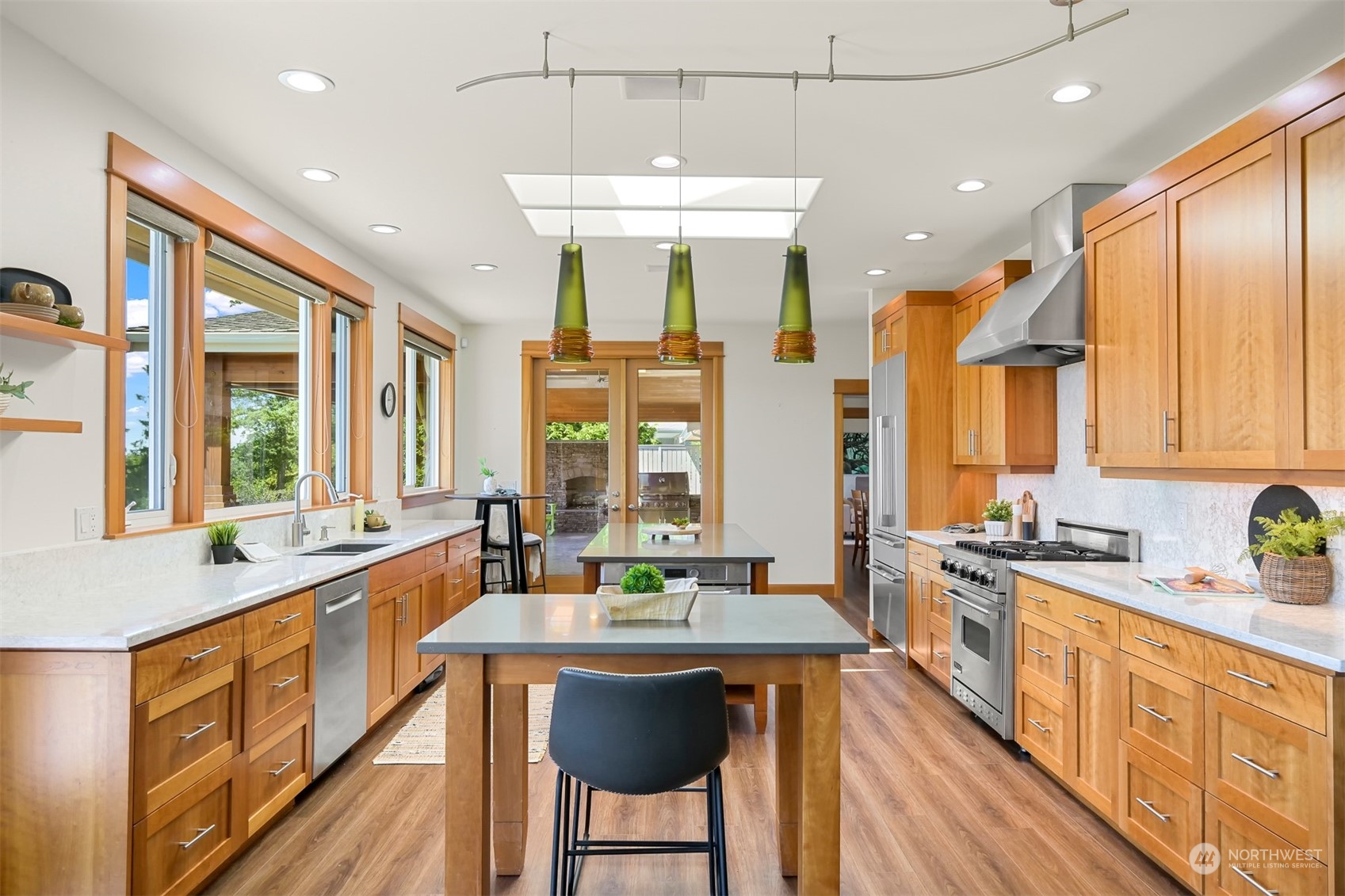 516 Briar Road Bellingham, WA 98225 - Photo 11 of 39 a large kitchen with kitchen island granite countertop a large window