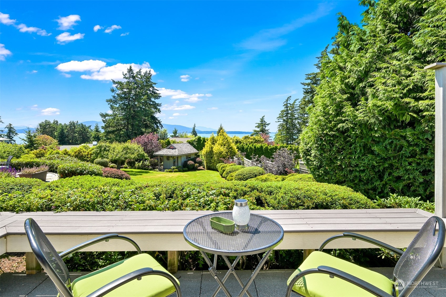 516 Briar Road Bellingham, WA 98225 - Photo 16 of 39 a view of a chairs and table in a backyard