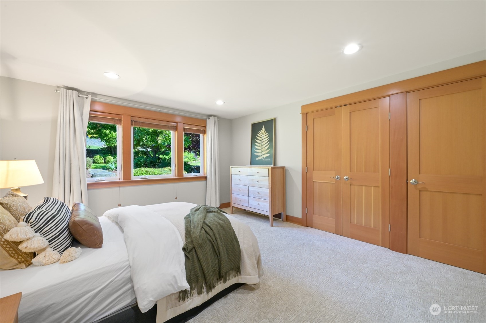 516 Briar Road Bellingham, WA 98225 - Photo 22 of 39 a bed sitting in a spacious bedroom next to a window