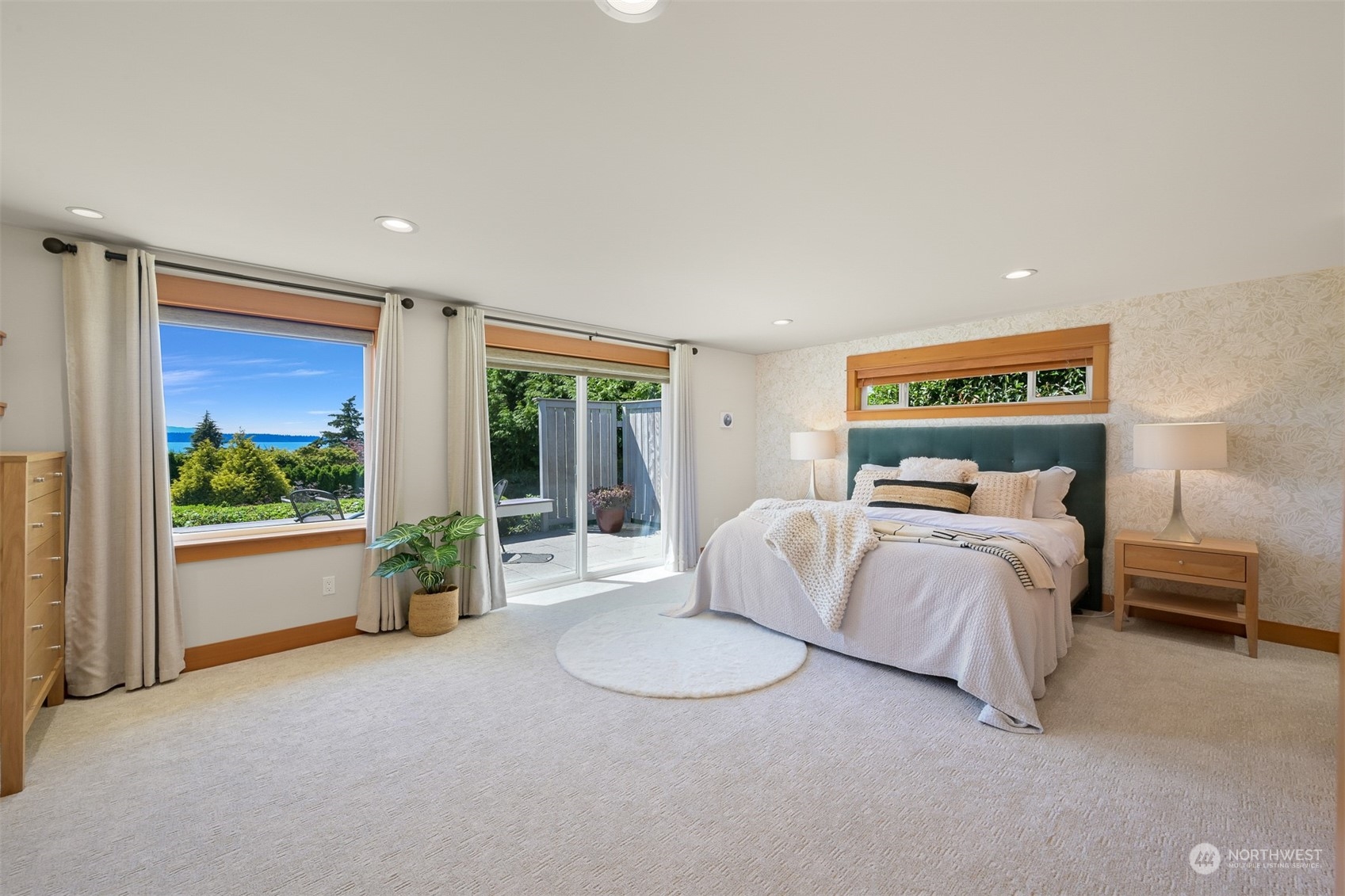 516 Briar Road Bellingham, WA 98225 - Photo 26 of 39 a spacious bedroom with a bed and a large window