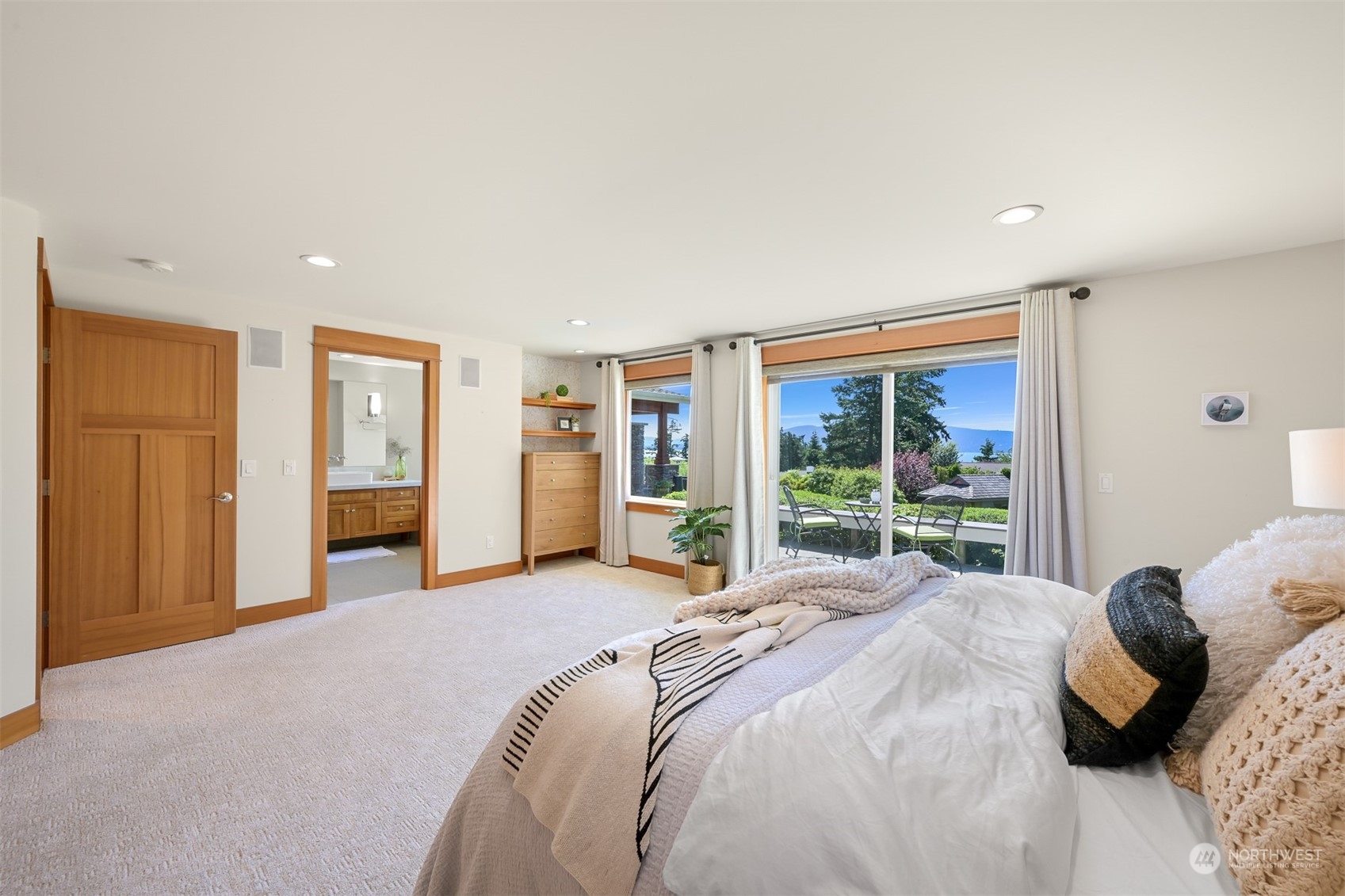 516 Briar Road Bellingham, WA 98225 - Photo 28 of 39 a bed sitting in a spacious bedroom next to a window