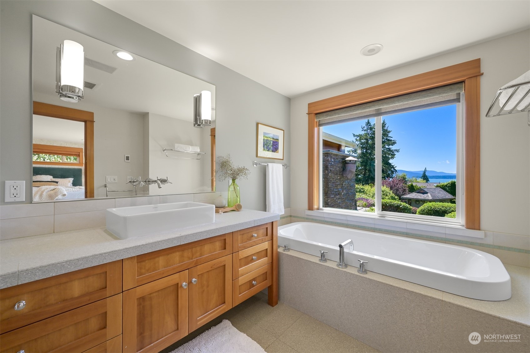 516 Briar Road Bellingham, WA 98225 - Photo 30 of 39 a bathroom with a granite countertop sink mirror bathtub and window
