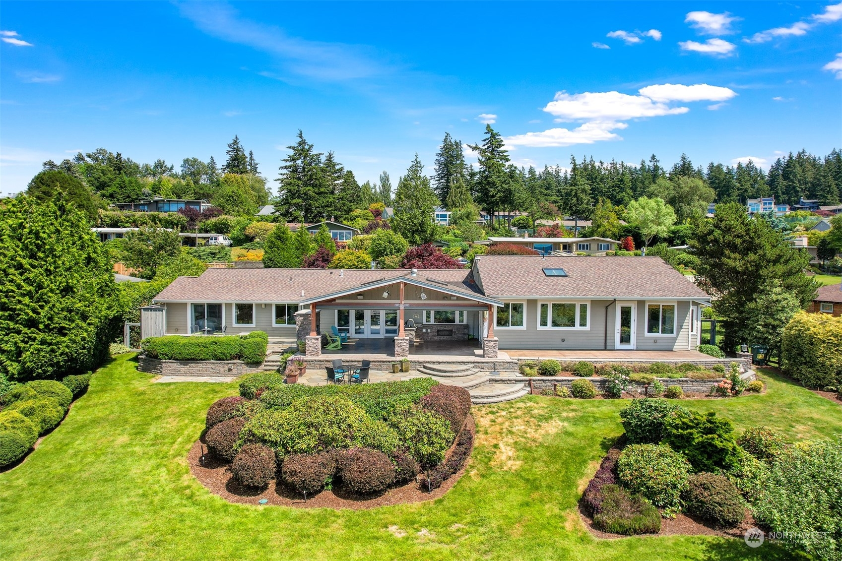 516 Briar Road Bellingham, WA 98225 - Photo 3 of 39 a front view of a house with a garden