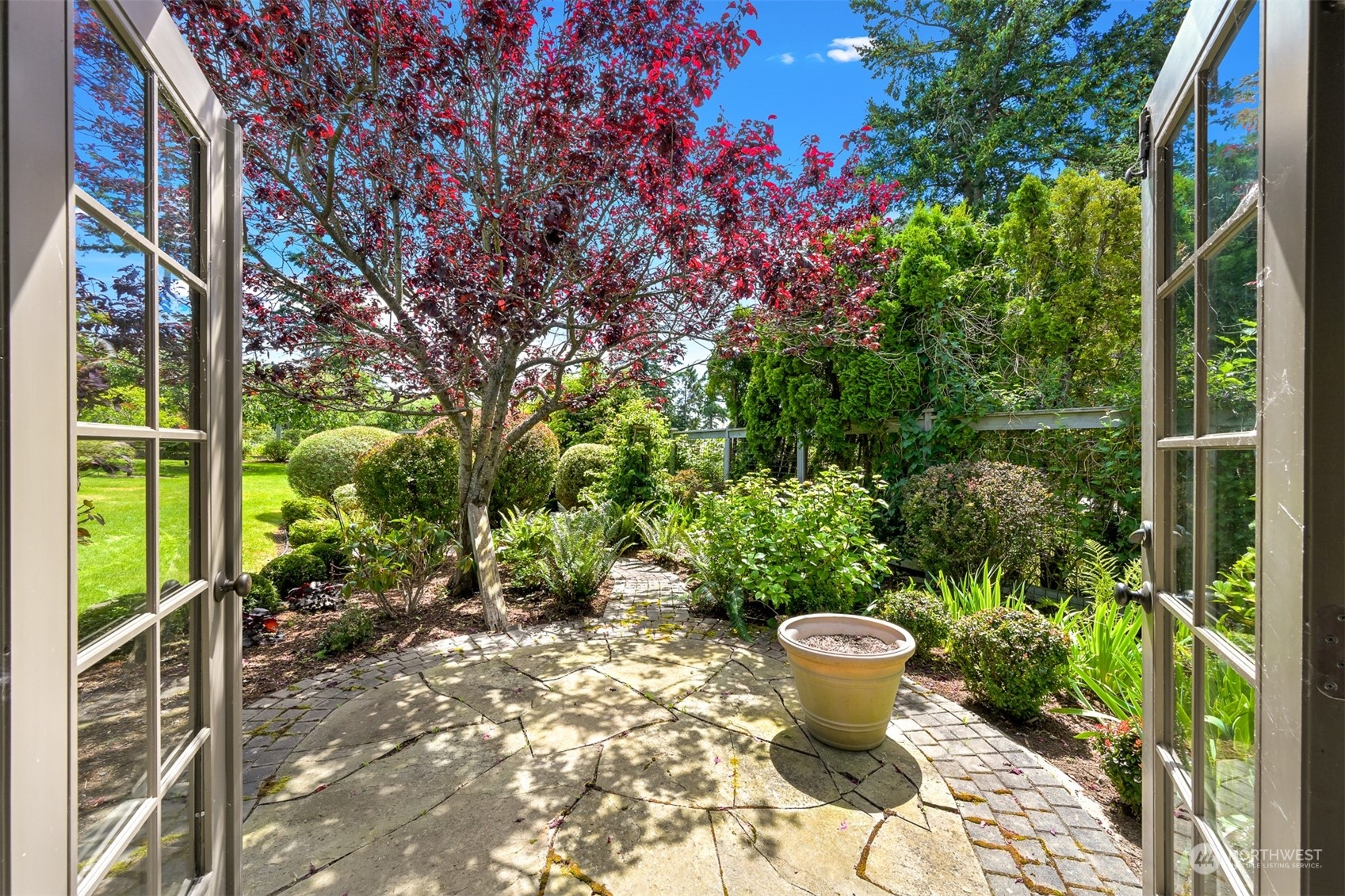 516 Briar Road Bellingham, WA 98225 - Photo 37 of 39 a view of a garden with potted plants