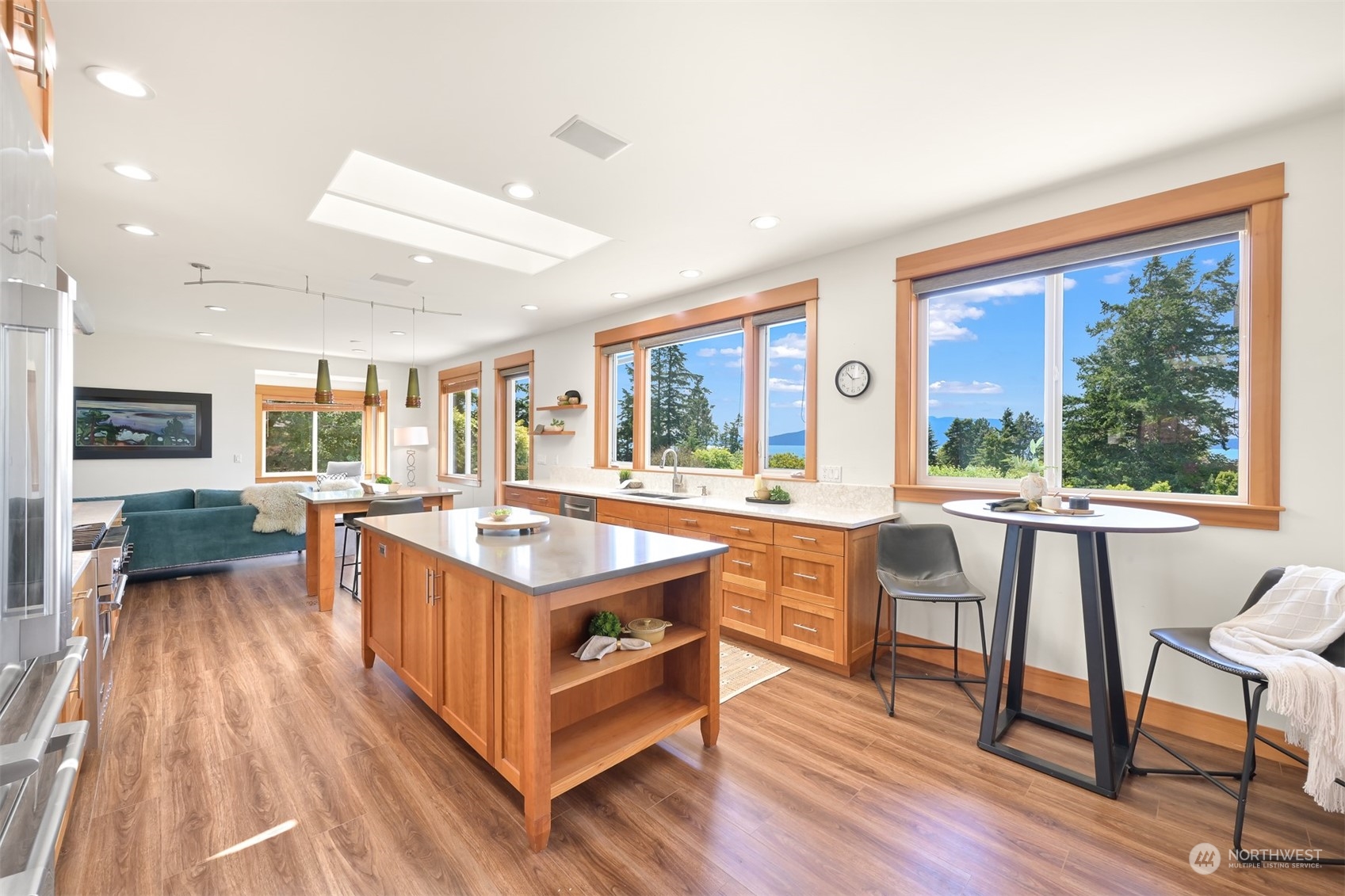 516 Briar Road Bellingham, WA 98225 - Photo 6 of 39 a living room with furniture a large window and wooden floor
