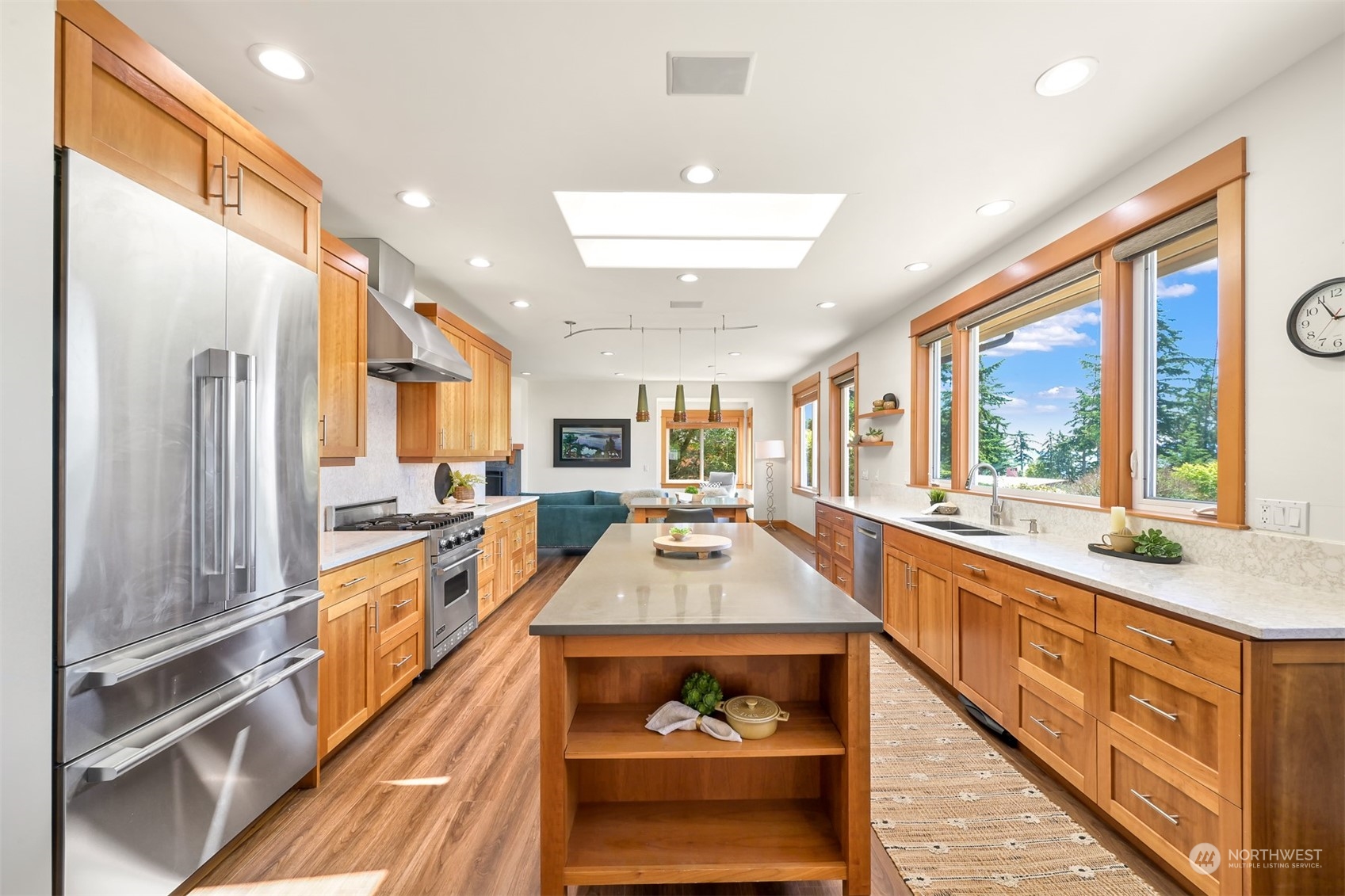 516 Briar Road Bellingham, WA 98225 - Photo 7 of 39 a large kitchen with stainless steel appliances a large window and a counter space