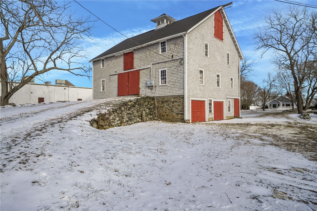 2967 East Main Road Portsmouth, RI 02871 - Photo 33 of 36 View of barn from entrance (parking area covered by snow)