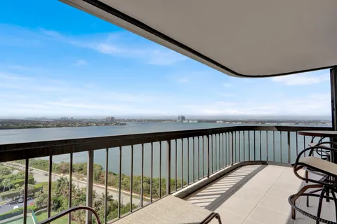 a view of balcony with furniture