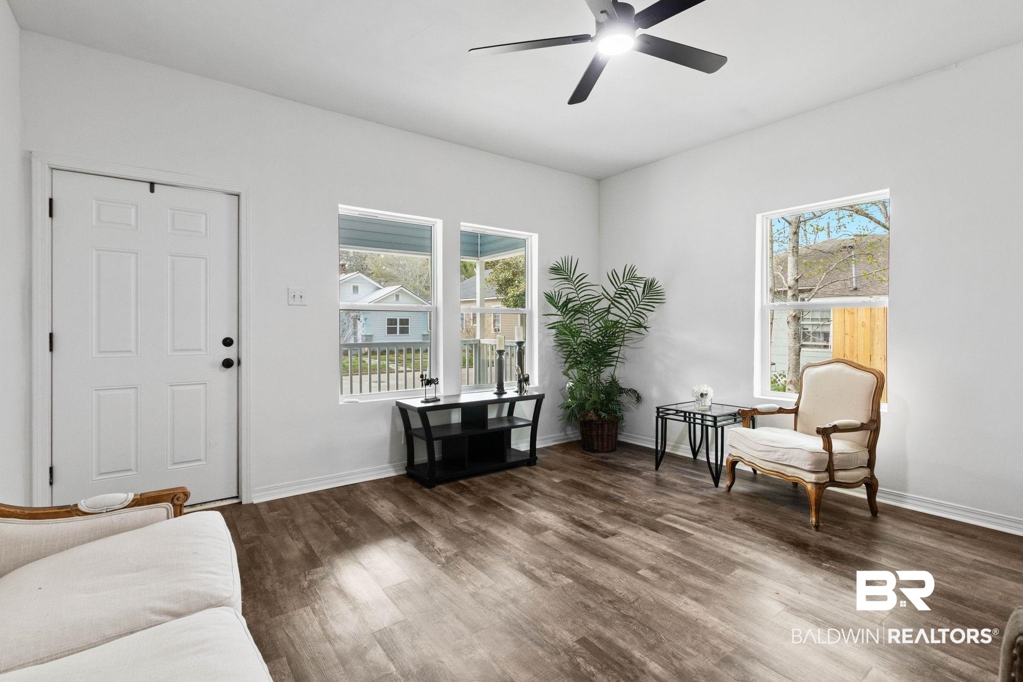 128 Bush Avenue Mobile, AL 36604 - Photo 6 of 40 Living area featuring dark wood finished floors, plenty of natural light, and ceiling fan