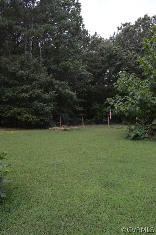 7308 Trinity Church Road Church Road, VA 23833 - Photo 23 of 37 a view of outdoor space with deck and yard
