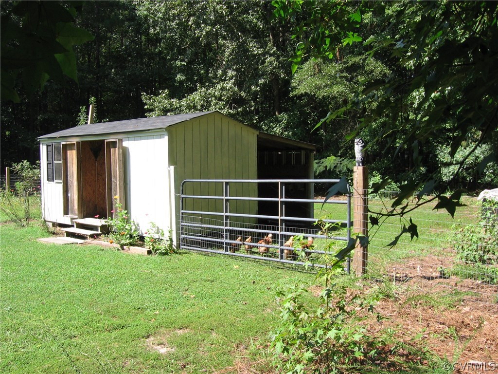 7308 Trinity Church Road Church Road, VA 23833 - Photo 27 of 37 a view of a house with backyard and sitting area