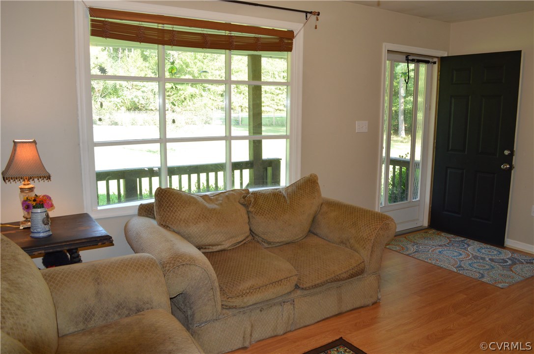7308 Trinity Church Road Church Road, VA 23833 - Photo 3 of 37 a living room with furniture and a window