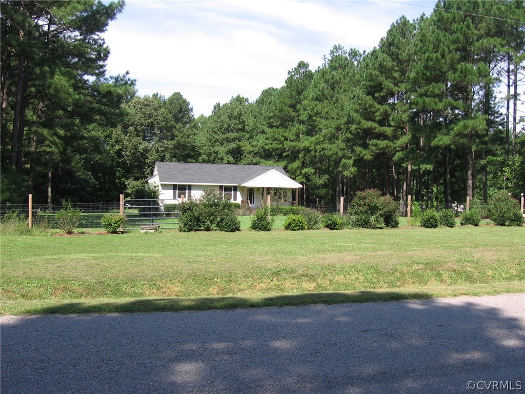 7308 Trinity Church Road Church Road, VA 23833 - Photo 32 of 37 a view of a house with a yard